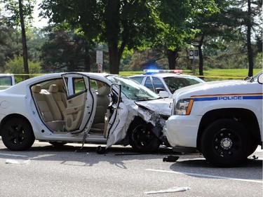 Seven people were injured when an RCMP SUV and a stolen Mazda 3 collided in front of the Supreme Court building on Wellington Street on Sunday.