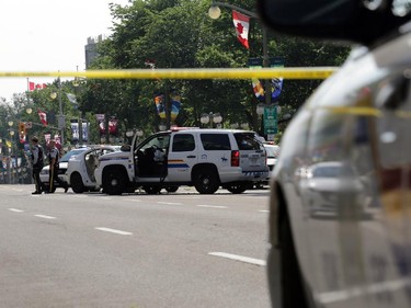 Several people are in hospital after an RCMP SUV and a Mazda 3 collided in front of the Supreme court building on Wellington St. in Ottawa, Sunday, June 29, 2014.