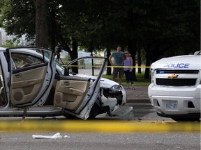 Several people are in hospital after an RCMP SUV and a Mazda 3 collided in front of the Supreme court building on Wellington St. in Ottawa, Sunday, June 29, 2014.