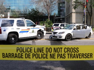 Several people are in hospital after an RCMP SUV and a Mazda 3 collided in front of the Supreme court building on Wellington St. in Ottawa, Sunday, June 29, 2014.
