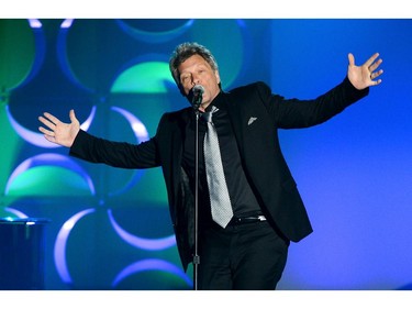 NEW YORK, NY - JUNE 12:  Jon Bon Jovi performs onstage at the Songwriters Hall of Fame 45th Annual Induction and Awards at Marriott Marquis Theater on June 12, 2014 in New York City.