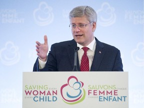 Prime Minister Stephen Harper speaks to the media during the closing press conference after attending the Maternal, Newborn and Child Health Summit in Toronto on Friday, May 30, 2014.