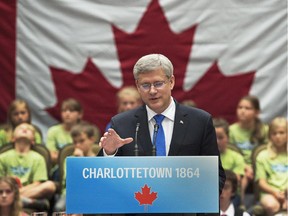 Prime Minister Stephen Harper addresses the audience at the Confederation Centre of the Arts, in Charlottetown on Thursday.