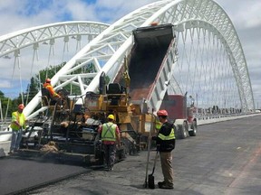 Strandherd bridge being paved June 9