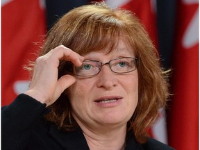Information Commissioner Suzanne Legault speaks during a press conference in Ottawa, Thursday Oct. 17, 2013.