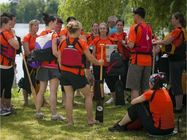 Teams gathered before they would hit the water at The 21st Tim Hortons Ottawa Dragon Boat Festival that took place this past weekend at Mooney's Bay Park. (Ashley Fraser / Ottawa Citizen)
