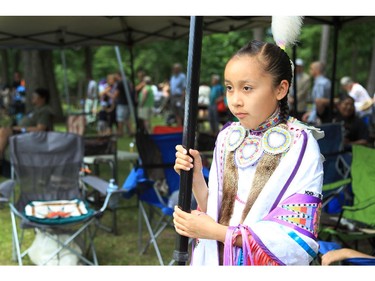 Ten-year-old Francesca Pheasant has been dancing since she was three, following in the tradition of her grandmother and father. Here she readies herself at the Summer Soltice Aboriginal Festival at Vincent Massey Park on Saturday.