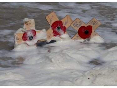 BAYEUX, FRANCE - JUNE 06:  Crosses left in the sea are washed away at Arrowmanches-Les-Bains during D-Day 70 Commemorations on June 6, 2014 near Bayeux, France. Friday 6th June is the 70th anniversary of the D-Day landings which saw 156,000 troops from the allied countries including the United Kingdom and the United States join forces to launch an audacious attack on the beaches of Normandy, these assaults are credited with the eventual defeat of Nazi Germany. A series of events commemorating the 70th anniversary are planned for the week with many heads of state travelling to the famous beaches to pay their respects to those who lost their lives