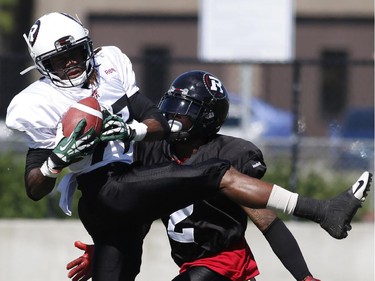 The Ottawa RedBlacks #77 Jamill Smith makes a catch during an intrasquad game at the Mont-Bleu Sports Complex in Gatineau on Saturday, June 7, 2014.