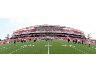 The Ottawa Redblacks practice on the new field at TD Place stadium in Ottawa on June 29, 2014.