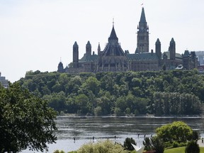 The Conservative government appointed its bureaucratic point man on energy policy to a new job at the International Monetary Fund and replaced him with the top executive at Environment Canada as part of a shuffle of the senior ranks.