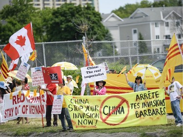 The Vietnamese community members from Ottawa, Toronto and Montreal gather to protest in front of Chinese Embassy on Sunday, June 8, 2014. The Vietnamese community members are protesting against the Chinese government's aggressive territorial policy toward Vietnam, and against the weak response as well as the suppression of patriotic demonstrations by Vietnamese citizens on the part of the Vietnamese government. (James Park / Ottawa Citizen)