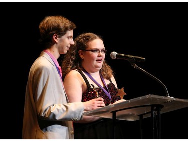 The winner for Male Critic: Soren Wainio-Theberge (L), Bell High School and Female Critic: Miranda Scharf (R), Bell High School accept their award, during the 9th annual Cappies Gala awards, held at the National Arts Centre, on June 08, 2014, in Ottawa, Ont.