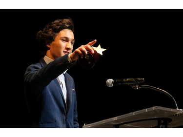 The winner for Supporting Actor in a Play: Erikson Downey, Holy Trinity Catholic High School, for The Three Musketeers, accepts his award, during the 9th annual Cappies Gala awards, held at the National Arts Centre, on June 08, 2014, in Ottawa, Ont.