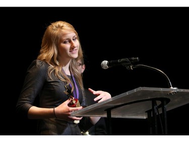 The winner for Supporting Actress in a Musical: Megan Milette, Longfields-Davidson Heights Secondary School, for Zombie Prom, accepts her award, during the 9th annual Cappies Gala awards, held at the National Arts Centre, on June 08, 2014, in Ottawa, Ont.