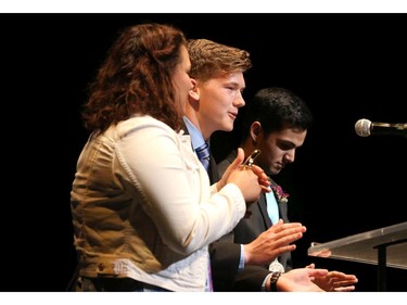 The winners for Marketing and Publicity: Hayley Cannon (L), Matthew Ciliberto (R), and Connell McCarthy (M), St. Joseph High School, for Suite Surrender, accepts their award, during the 9th annual Cappies Gala awards, held at the National Arts Centre, on June 08, 2014, in Ottawa, Ont.