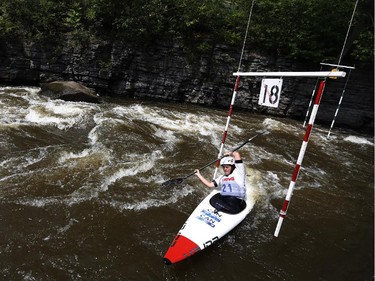 Thea Froehlich competes in Kayak (K1) Women at the first Ontario canoe slalom race of the year, at the Pumphouse downtown Ottawa on June 29, 2014. Many of these paddlers have hopes of representing Ontario at the PanAm games in 2015, while others are local recreational paddlers racing for the first time.
