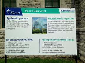 An example of new development street signs announced Monday that use plainer language and images of proposals when applicable.