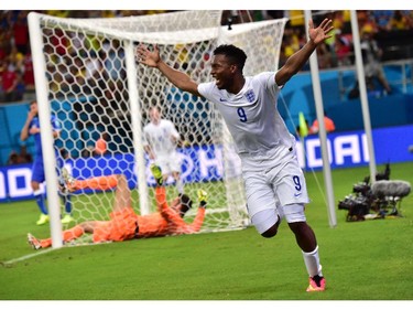 England's forward Daniel Sturridge celebrates after scoring a goal during a Group D football match between England and Italy at the Amazonia Arena in Manaus during the 2014 FIFA World Cup on June 14, 2014.