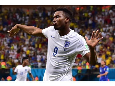 England's forward Daniel Sturridge celebrates after scoring a goal during a Group D football match between England and Italy at the Amazonia Arena in Manaus during the 2014 FIFA World Cup on June 14, 2014.