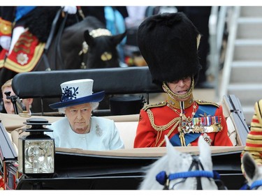 Queen Elizabeth II and Prince Phillip, Duke Of Edinburgh arrive at Horseguards Parade during Trooping the Colour at The Royal Horseguards on June 14, 2014 in London, England.