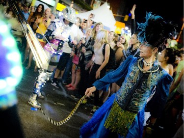 Twelve-foot wide neon street performance pieces by Montreal-based Black Mohawk dazzled Glow Fair goers on Bank Street.