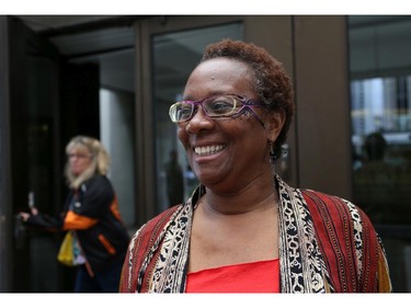 University of Ottawa law professor Joanne St. Lewis smiles outside the Elgin St. courthouse in Ottawa, Thursday, June 5, 2014. St. Lewis was awarded $350,000 in damages by asix-member jury this morning in a libel/defamation action against Denis Rancourt.