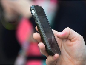 The federal government says it is owed millions in wrongfully charged late-payment fees to its phone service providers.