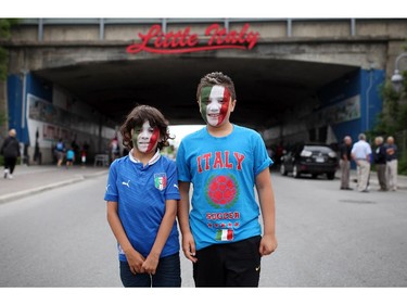 Valentino De Leon (L), 8, and Joseph Cama, 8, are dressed with country pride on Preston St. in Ottawa's Little Italy, during Italian Festival on Saturday, June 14, 2014.