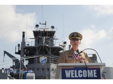 Walt Wittholz of Auburndale, Fla., a retired Navy officer and president of the U.S. LST Association, gives a few remarks during the D-Day Memorial Service aboard LST 325 in Evansville, Ind., on Friday, June 6, 2014. Wittholz was aboard LST 560 in the South Pacific on D-Day and remembers it taking a few days to hear the news.