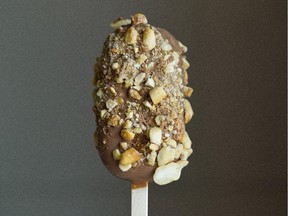 Pascale's new ice cream bars on a stick with malted chocolate ice cream rolled in salty sweet beer nuts.