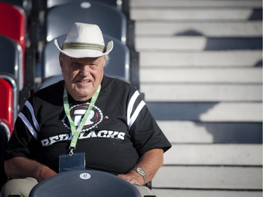 A Redblacks fan sits in the stands at the official opening of TD Place at Lansdowne Wednesday July 9. 2014.