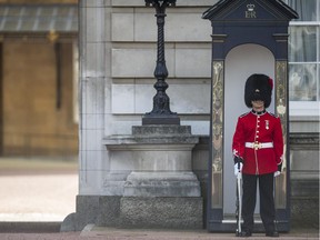 This 2014 file photo shows a Royal Guard outside Buckingham Palace.