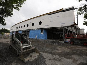 Unlike HMCS Carleton's former buildings, which were functional but plain, the new two-storey, 6,000-square-metre facility is meant to evoke a ship, with porthole windows and a swooping profile. Total budget for the demolition and construction is estimated at about $18.5 million.