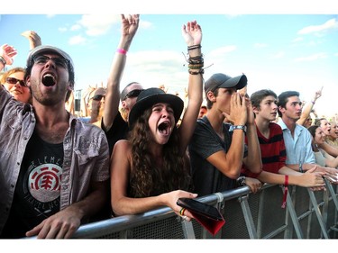 Alexa Rushton is in tears at the sight of Slash, featuring Myles Kennedy (vocals) and the Conspirators, performing on Friday night, July 11, 2014, at Bluesfest in LeBreton Flats.