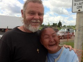 Annie Pootoogook, acclaimed Inuit artist, and her boyfriend, William Watt, who panhandles full-time.