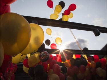 Balloons are released through the retractable roof during a ceremonial grand opening of Sens House, the official sports bar of the Ottawa Senators, in the Byward Mark at 73 York St. Thursday, July 24, 2014.