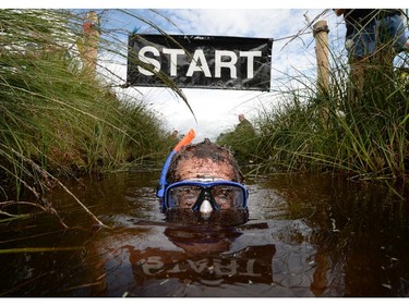 DUNGANNON, NORTHERN IRELAND - JULY 27:  Stephen McDonagh takes part in the Irish Bog Snorkelling championship at Peatlands Park on July 27, 2014 in Dungannon, Northern Ireland. The annual event sees male and female competitors swim the 60m length of the bog watched by scores of spectators and takes place on International Bog Day.