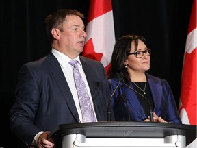 Michel Perron (left), Chief Executive Officer, Canadian Centre on Substance Abuse and National Advisory Council Co-Chair, is joined by Minister Aglukkaq (right) for the release of National Strategy First Do No Harm: Responding to Canada's Prescription Drug Crisis.