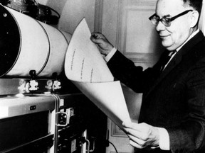 FILE - In this 1963 file photo, American seismologist Charles Francis Richter, who developed the first widely used seismic magnitude scale in 1935, studies earthquake tremors in his laboratory in Pasadena, Ca., in 1963. A ceremony in honor of Charles Richter Day, where he was born in 1900, is planned this Friday in Butler County, about 25 miles north of Cincinnati. (AP Photo, File)