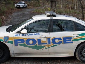 CHELSEA, QC: OCTOBER 22, 2011 - MRC des Collines police investigate a suspicious death of a 7-year-old girl at 80 chemin Barnes in Chelsea, Quebec on Saturday, October 22, 2011. Sophia Fitzpatrick was pronounced dead at Hull Hospital. Her mother and father are also in hospital. More to come. (photo by Mike Carroccetto / The Ottawa Citizen / Postmedia News)¤¤¤ (for WEB / CITY story by GLEN McGREGOR) NEG# 106342