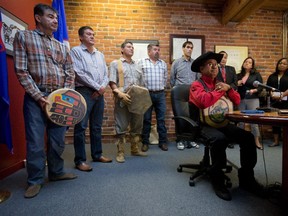 Chief Roger William, right, of the Xeni Gwet'in First Nation, is flanked by chiefs and other officials as he pauses while speaking during a news conference in Vancouver, B.C., after the Supreme Court of Canada ruled in favour of the Tsilhqot'in First Nation, granting it land title to 438,000-hectares of land on Thursday June 26, 2014.