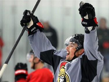 Cody Ceci celebrates a goal from his "team" at the Senators development camp, which had their final 3 on 3 tournament Monday July 7, 2014 at the Bell Sensplex.
