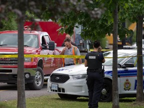 A worker was killed Thursday when he was pinned beneath a tandem trailer on a worksite near the Canadian War Museum.