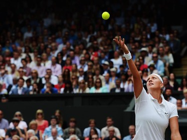 Petra Kvitova of Czech Republic serves during the Ladies' Singles final match against Eugenie Bouchard of Canada on day twelve of the Wimbledon Lawn Tennis Championships at the All England Lawn Tennis and Croquet Club on July 5, 2014 in London, England.