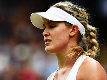 Eugenie Bouchard of Canada stands dejected during the Ladies' Singles final match against Petra Kvitova of Czech Republic on day twelve of the Wimbledon Lawn Tennis Championships at the All England Lawn Tennis and Croquet Club on July 5, 2014 in London, England.