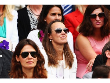 Martina Hingis sits in the Royal Box on Centre Court before the Ladies' Singles final match between Eugenie Bouchard of Canada and Petra Kvitova of Czech Republic on day twelve of the Wimbledon Lawn Tennis Championships at the All England Lawn Tennis and Croquet Club on July 5, 2014 in London, England.