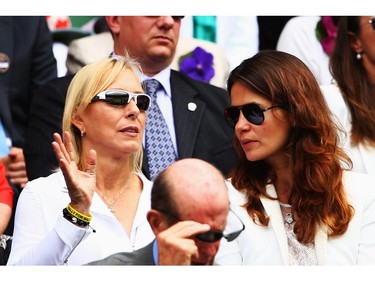 Martina Navratilova and Julia Lemigova sit in the Royal Box on Centre Court before the Ladies' Singles final match between Eugenie Bouchard of Canada and Petra Kvitova of Czech Republic on day twelve of the Wimbledon Lawn Tennis Championships at the All England Lawn Tennis and Croquet Club on July 5, 2014 in London, England.