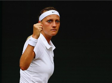 Petra Kvitova of Czech Republic celebrates during the Ladies' Singles final match against Eugenie Bouchard of Canada on day twelve of the Wimbledon Lawn Tennis Championships at the All England Lawn Tennis and Croquet Club on July 5, 2014 in London, England.