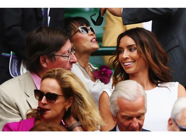 Max Hastings talks with Christine Bleakley as they sit in the Royal Box on Centre Court before the Ladies' Singles final match between Eugenie Bouchard of Canada and Petra Kvitova of Czech Republic on day twelve of the Wimbledon Lawn Tennis Championships at the All England Lawn Tennis and Croquet Club on July 5, 2014 in London, England.